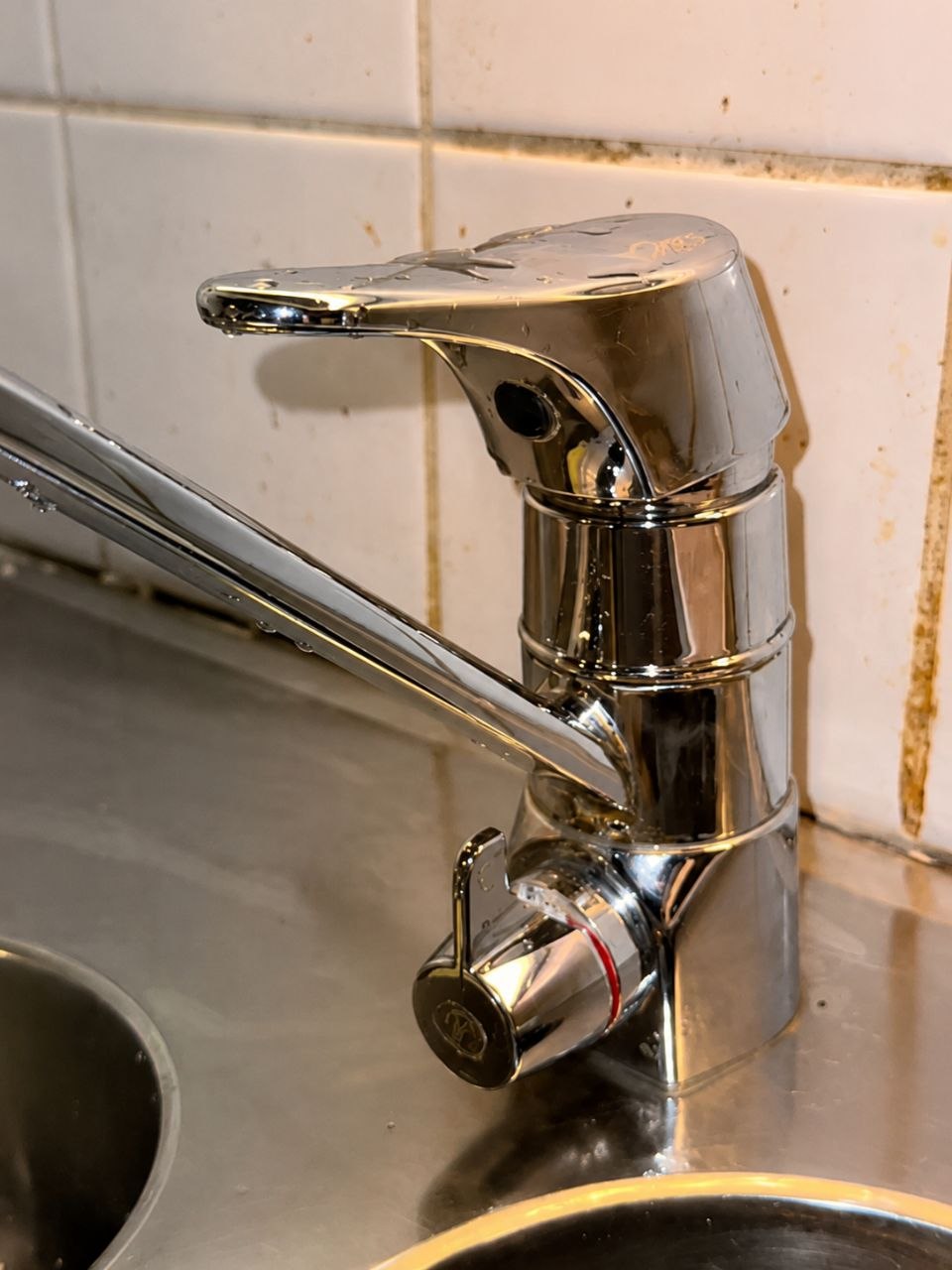 Gereinigter Wasserhahn nach der Reinigung